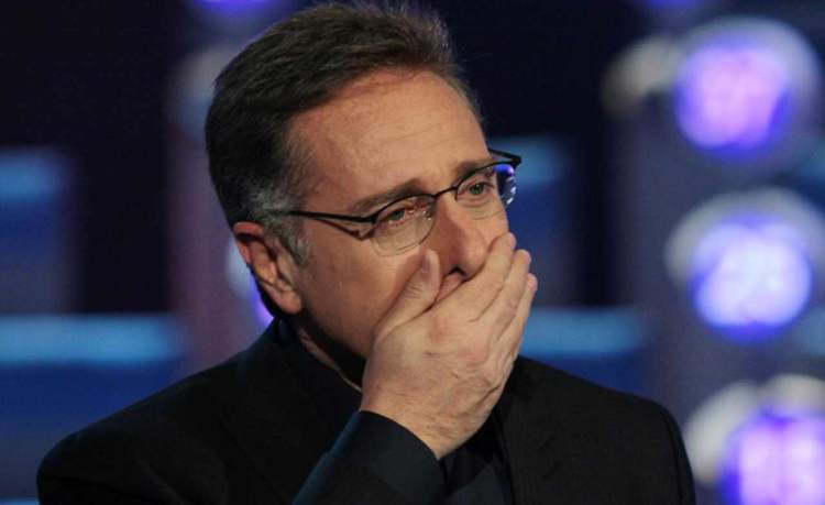 paolo mano in faccia